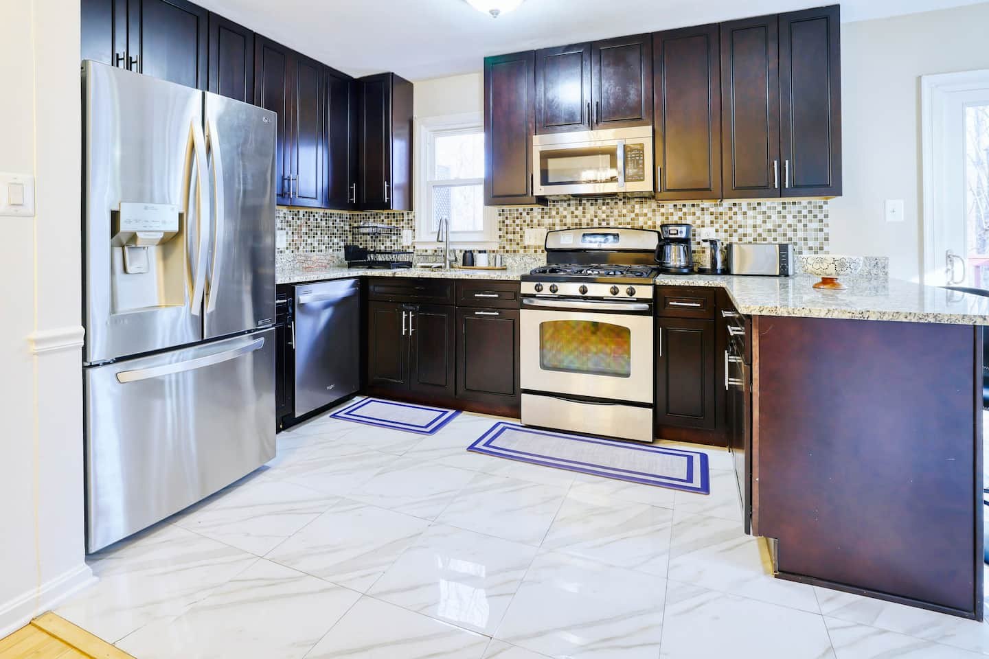 Kitchen with granite counters and stainless steel appliances